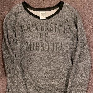 University of Missouri sweatshirt.